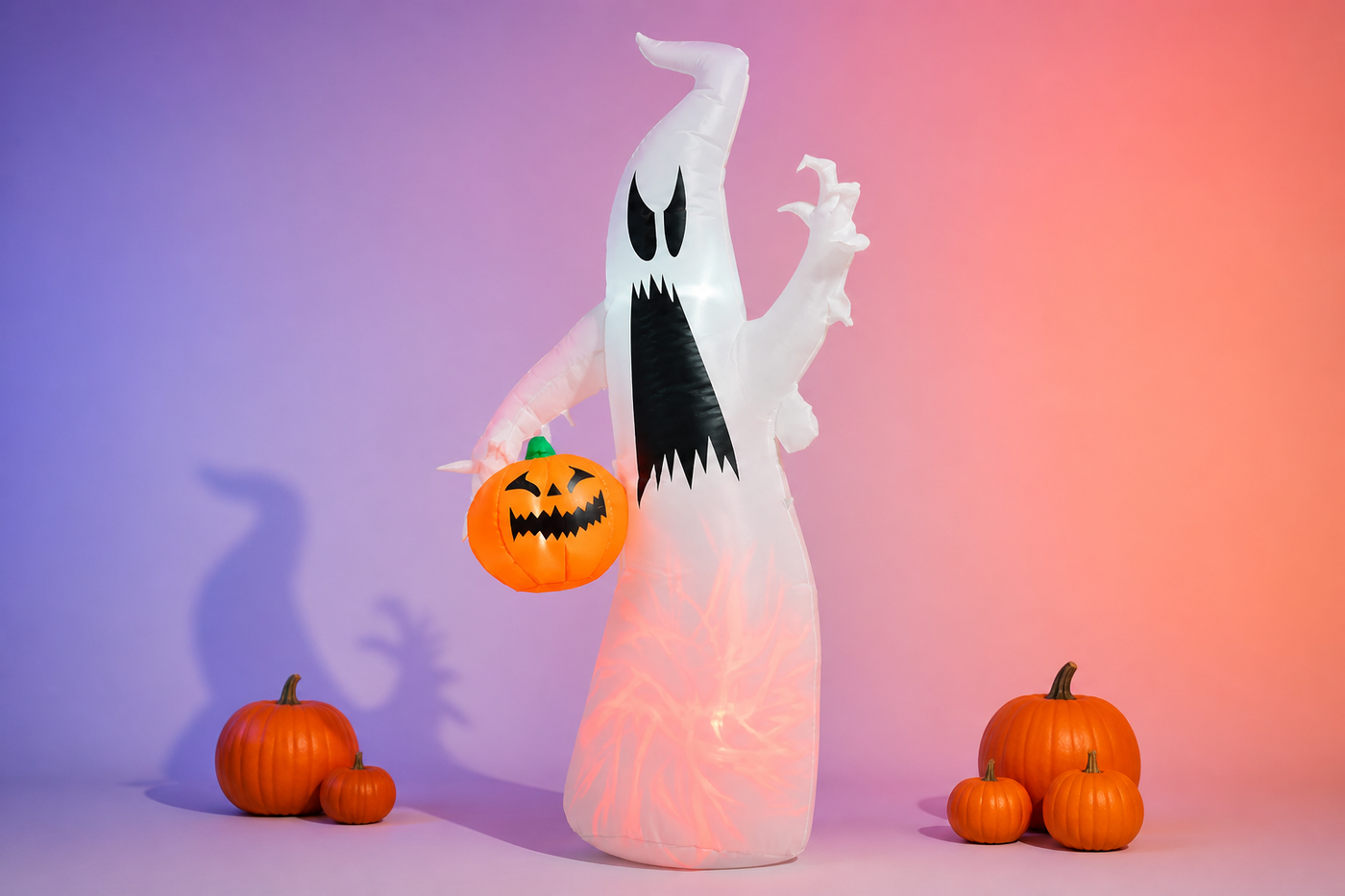 WraithGlow white ghost inflatable with jagged black mouth and orange pumpkin pail