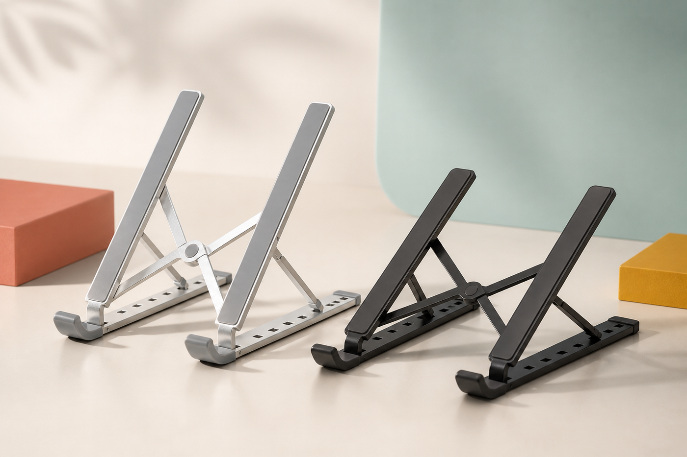 Silver and black RiseRail two-rail folding laptop stand options