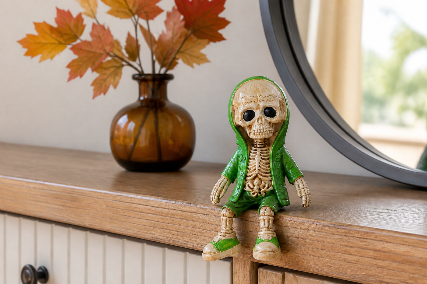 Green B ShelfBones seated skeleton figurine on a bright entry console