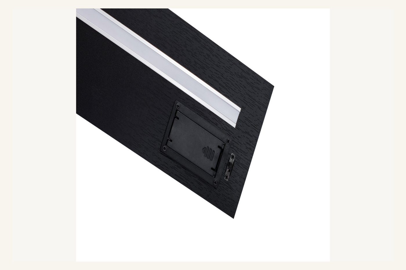 Halo LED floating shelf showing recessed light, battery compartment, and switch