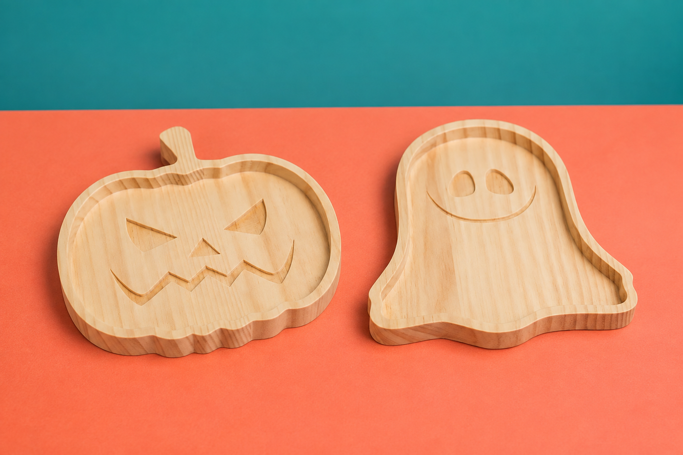 CarveGlow Pumpkin and Ghost tray variants showing natural pine grain shallow profile and routed construction