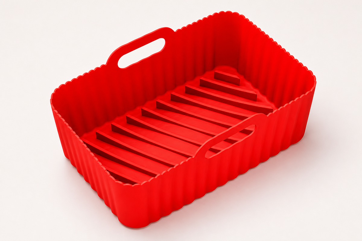 Red CrispNest reusable silicone air-fryer liner