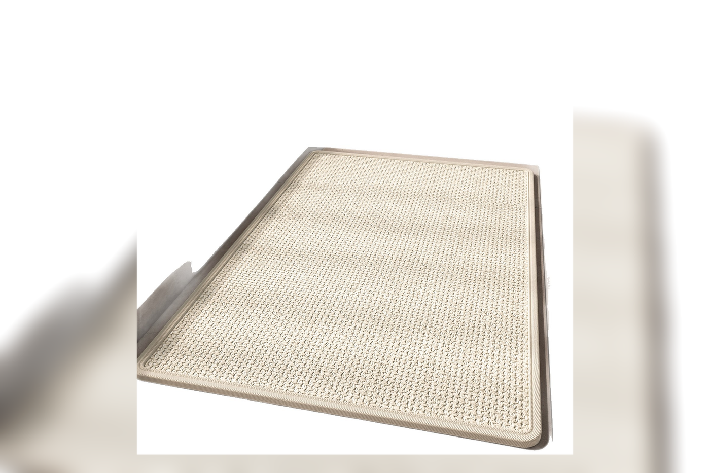 Exact low-profile Loom mat showing woven surface bound edge and rounded corners