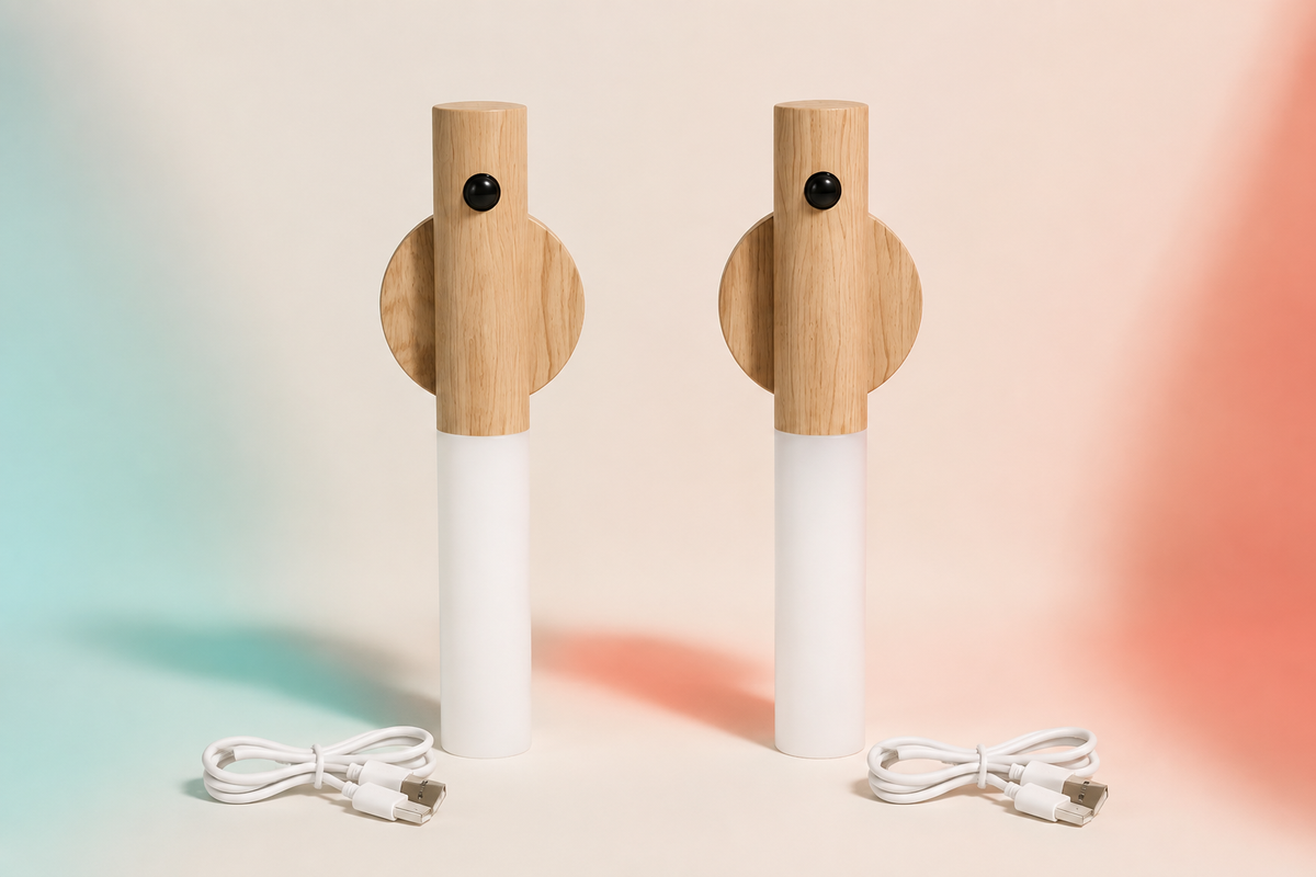 Two GlowSense motion lights in Ash with two charging cables