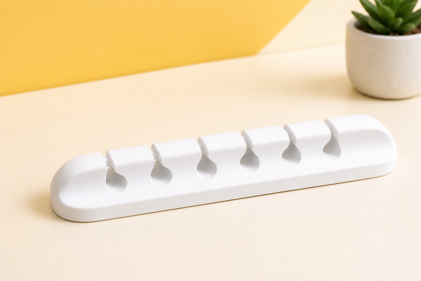 White CordCove cable organizer with exactly seven slots