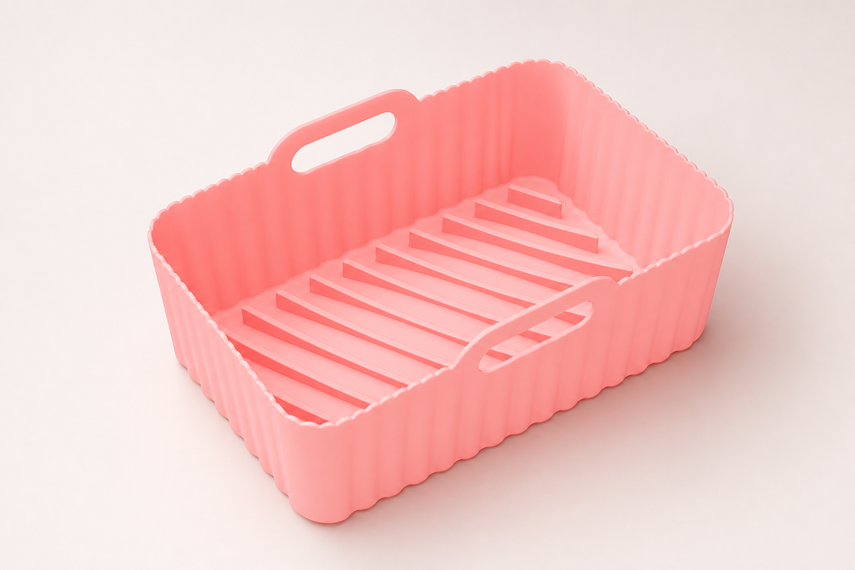 Pink CrispNest reusable silicone air-fryer liner
