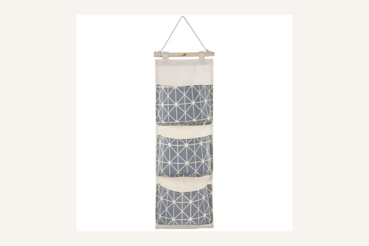 Exact Grey Sill three-pocket hanging organizer with wooden dowel