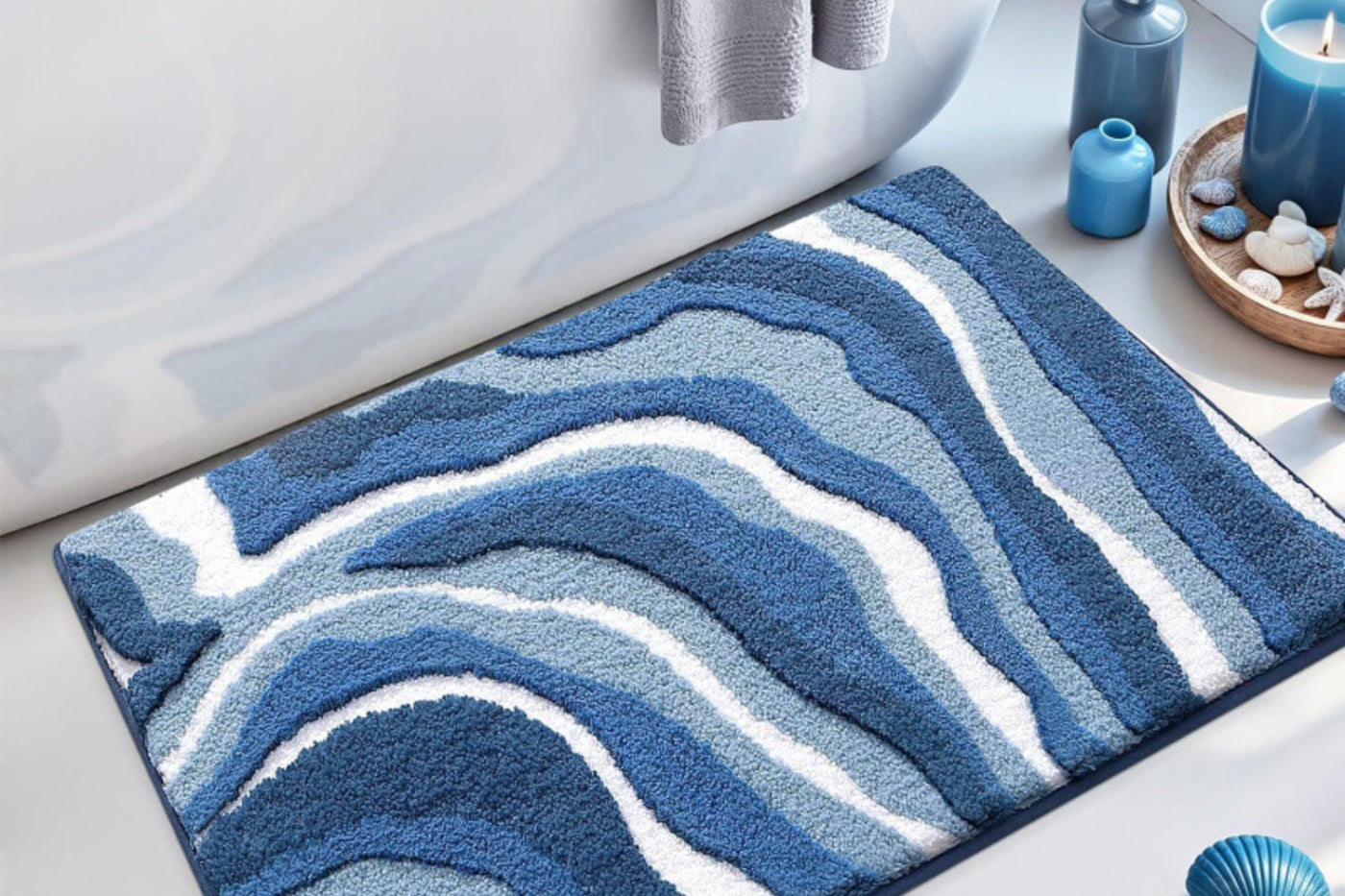 Blue Ripple Drift bath mat with a blue wave pattern