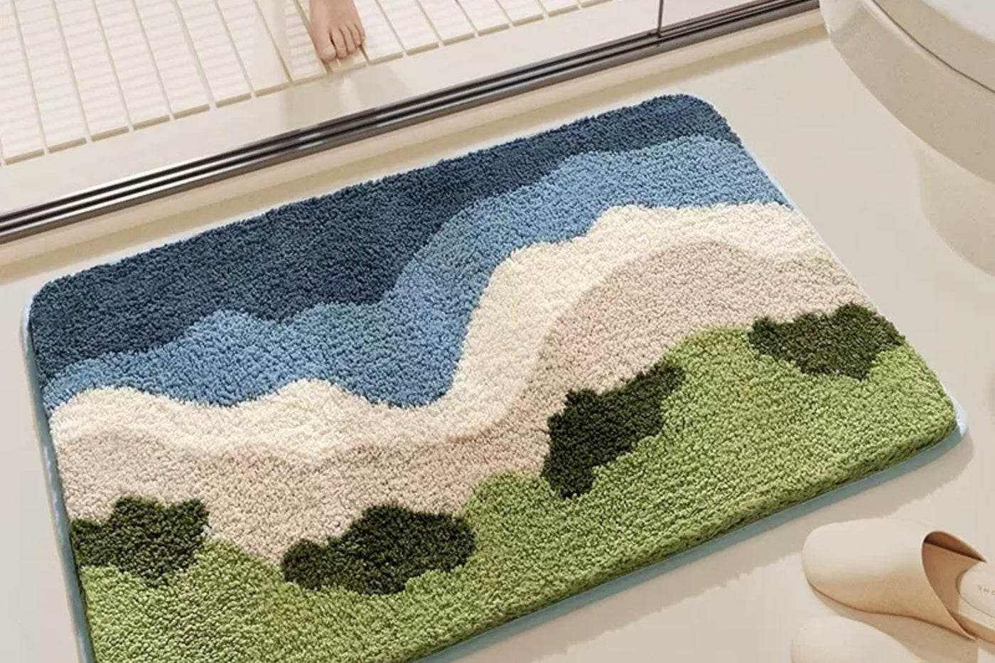 Mountain Mist Drift bath mat with blue and green landscape