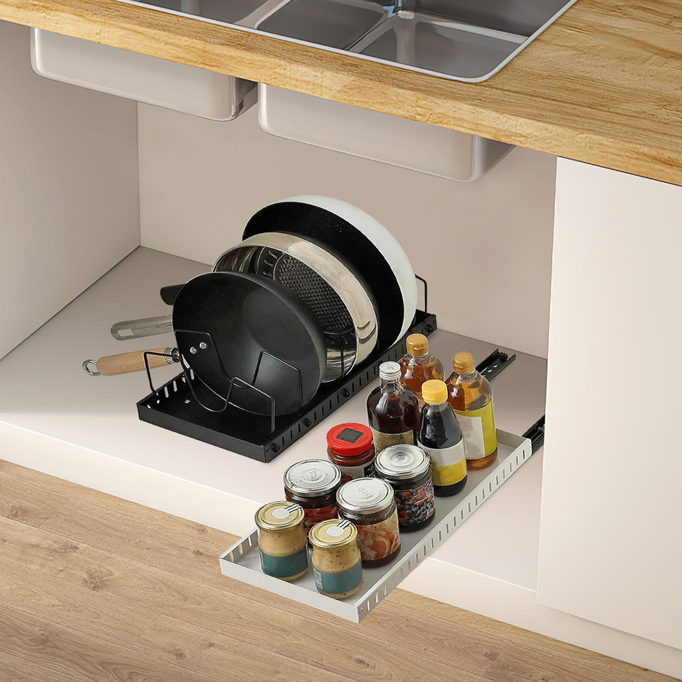 GlideRack loaded with pans and jars, pulled out from a cabinet under a sink