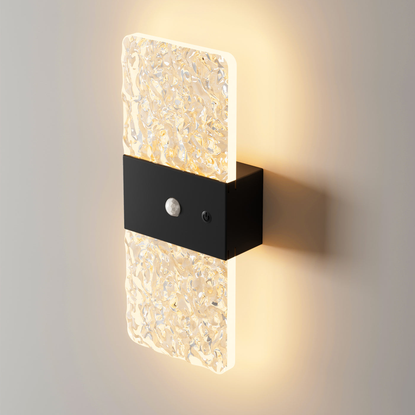 Facet wall light in Black Rectangle with a warm glow