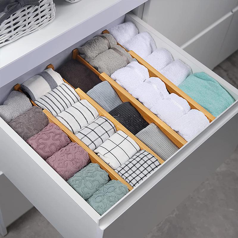 BambooGrid divider set organizing folded items in a drawer