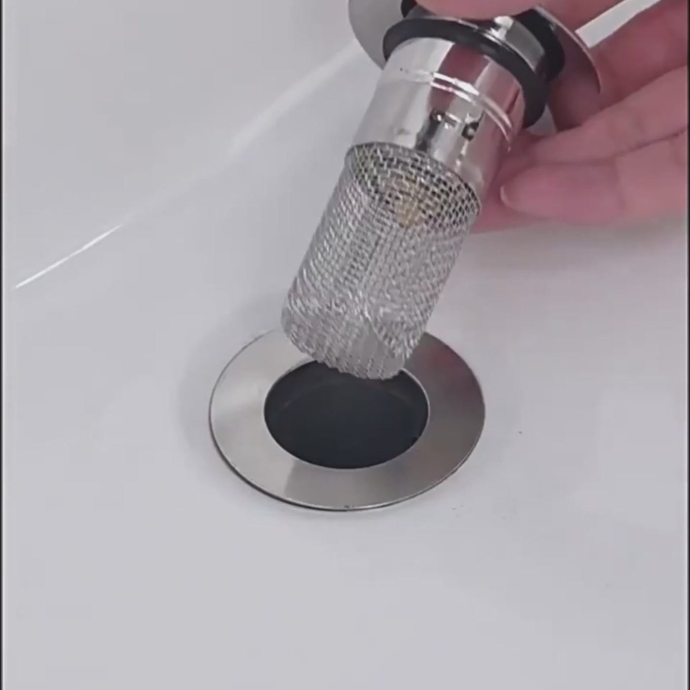 DrainGuard demonstration catching debris and rinsing clean