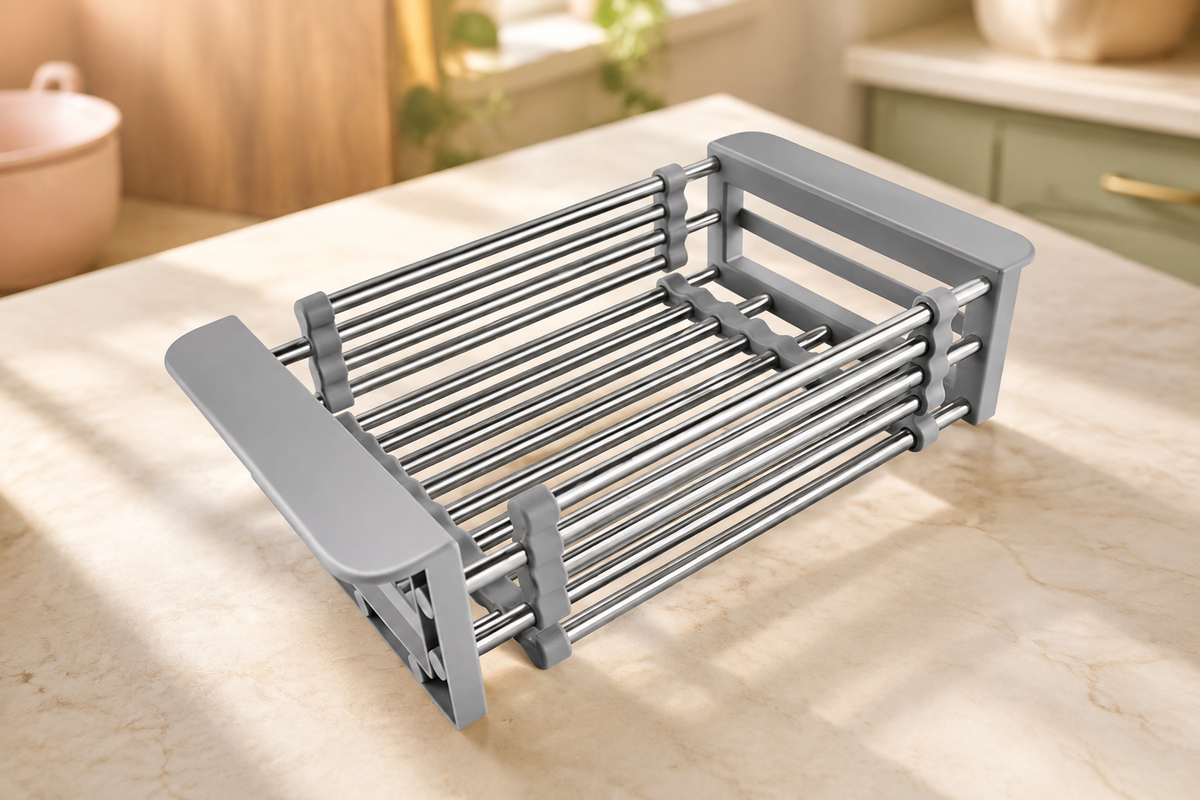 Gray expandable sink basket with stainless steel rods